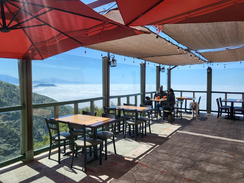 Restaurant patio with views and casual seating.