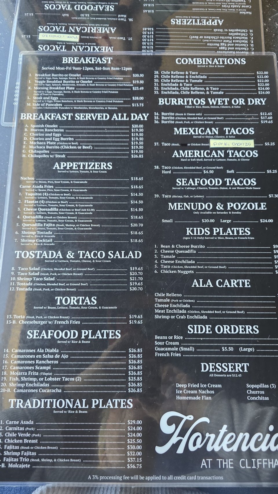 Printed menu with breakfast, lunch, and dinner sections.